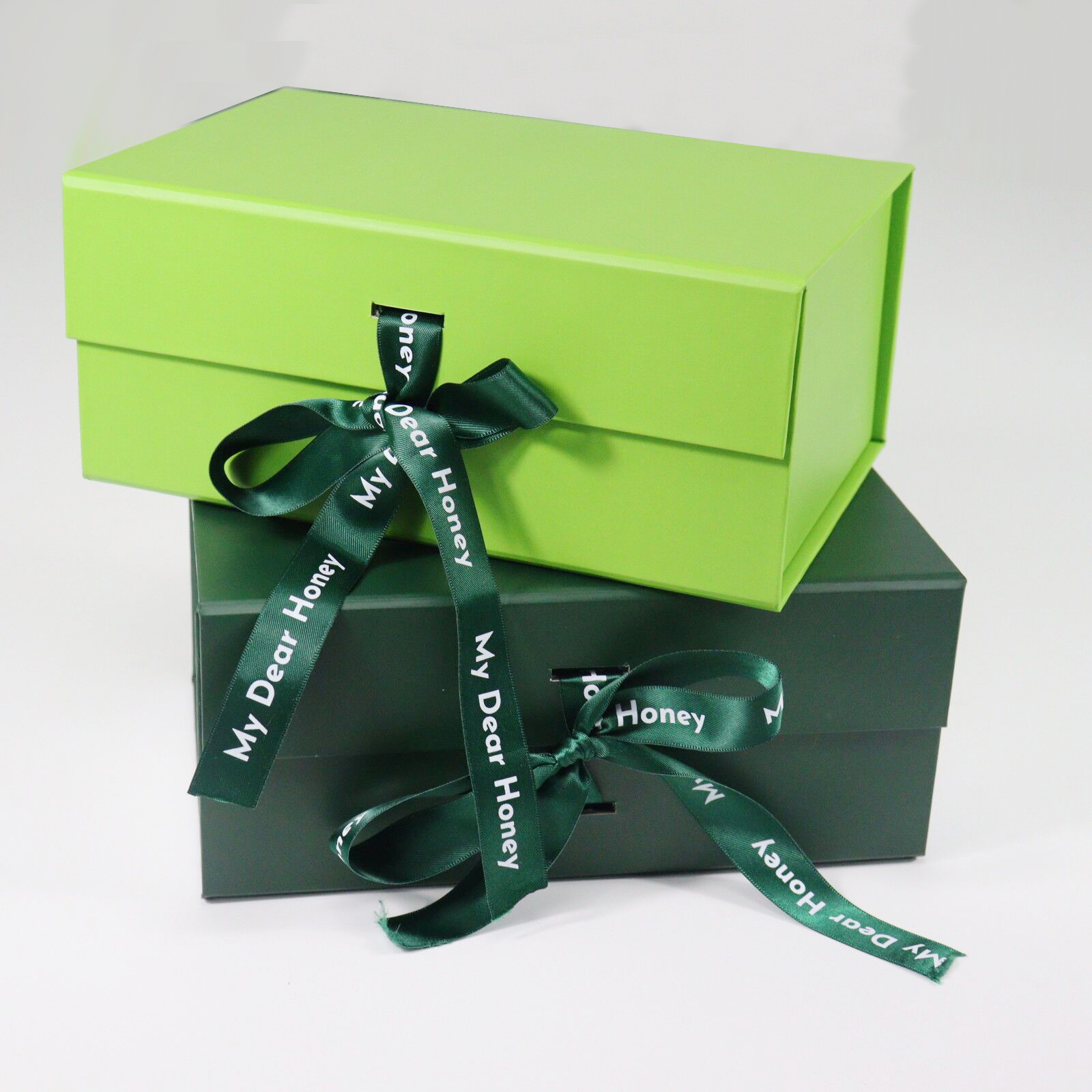Confezione regalo pieghevole con nastro